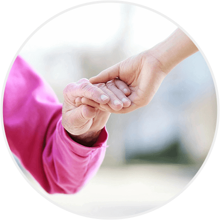 Daughter holding hand of her mother